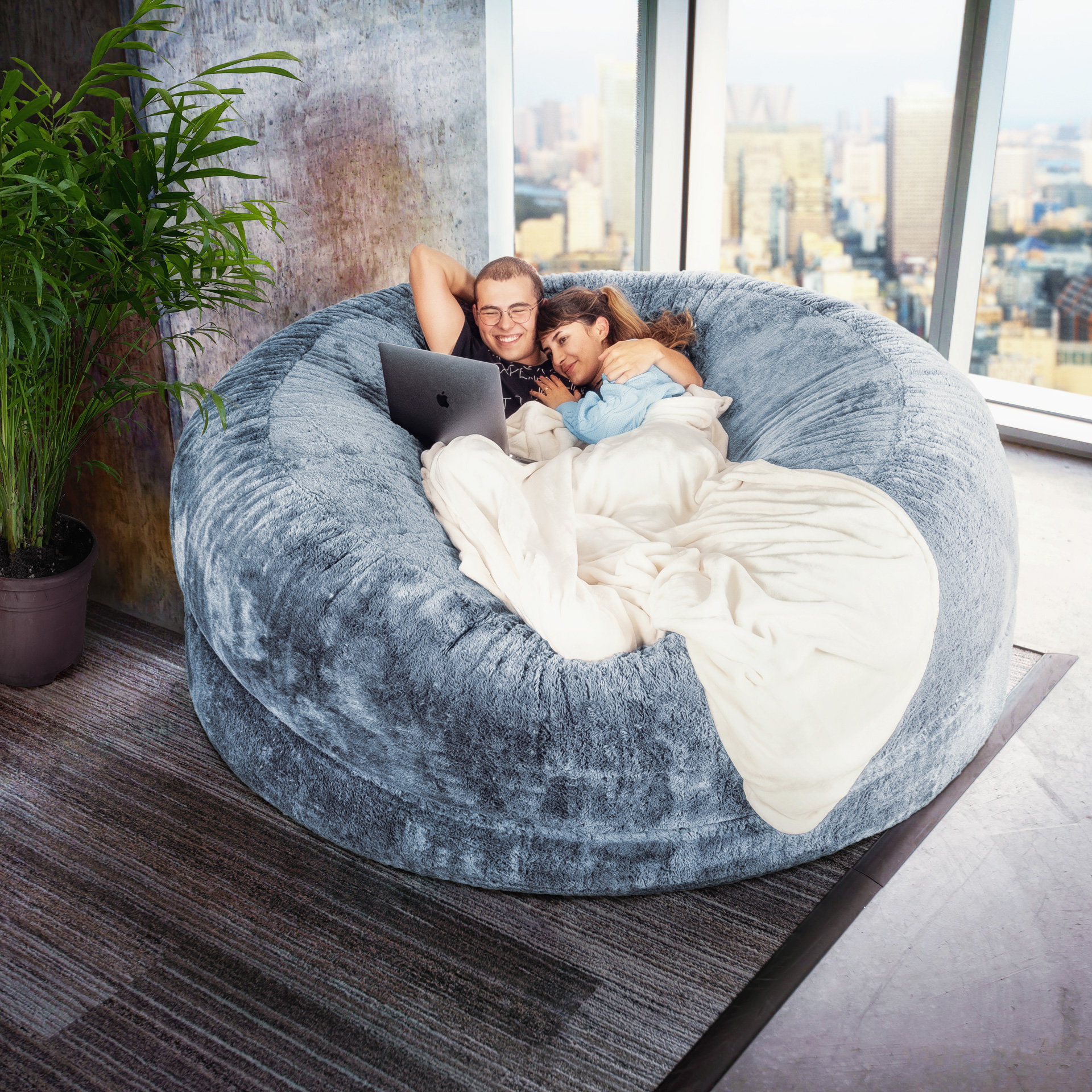 Couple relaxing on a Cosac beanbag